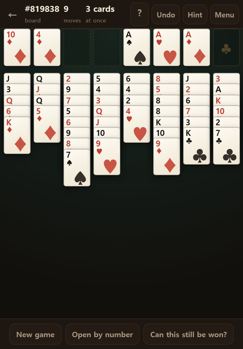 A card parked in a free cell at the top left. The more cells you fill, the fewer cards you can move at once.