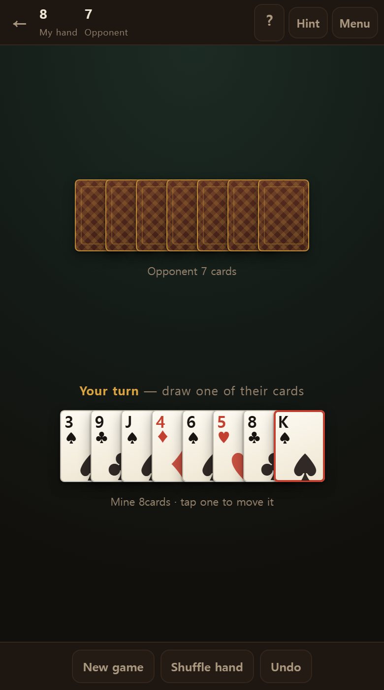 Their hand above, yours below. The red ring marks the odd card (K♠), and only you can see it.