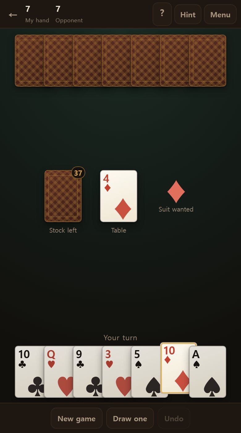 A fresh deal. Seven cards each, and one plain card turned up on the table.