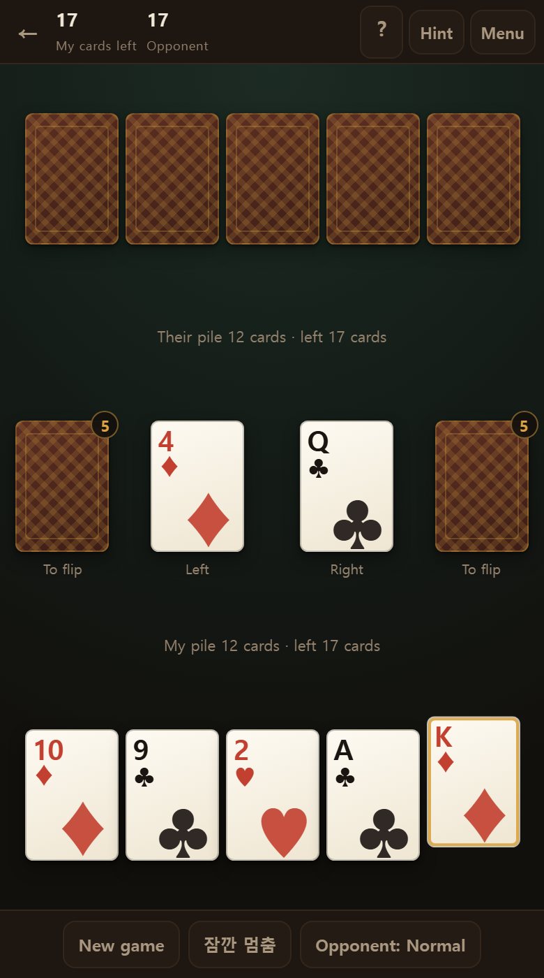 Their hand above; the two inner piles in the middle are where you play, the two outer ones are the flip piles for when both sides stick.